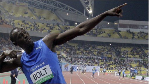 Bolt cruises to victory in 200 meters in Shanghai.