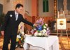 Joel Chin - CLIVE CHIN, FATHER OF JOEL CHIN  PAUSE TO TOUCH THE URN OF HIS SON  AT MEMORAL SERVI.jpg