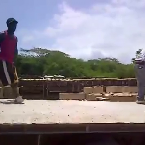 2 Jamaican Men Arguing